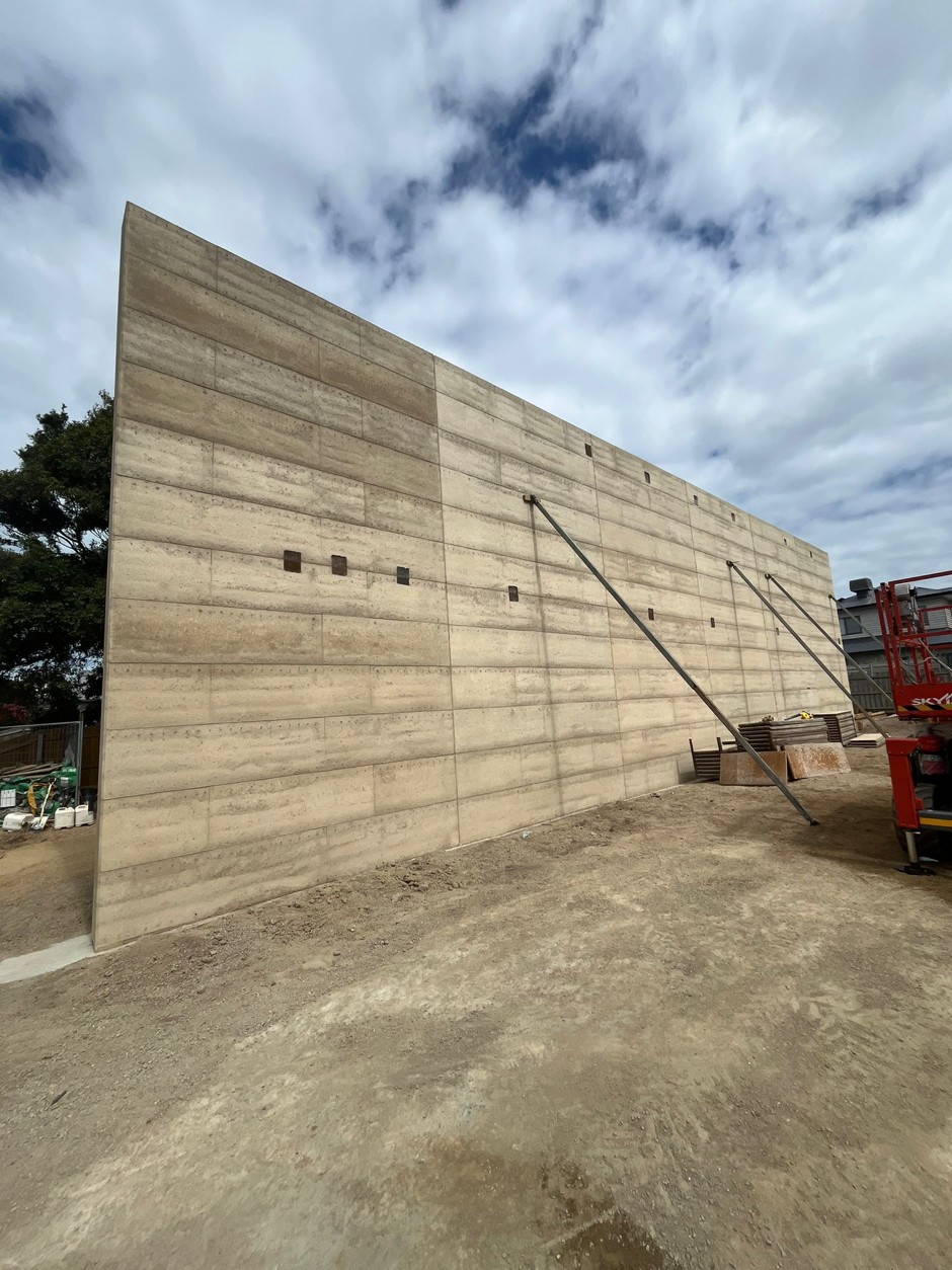 Rammed earth partition wall construction, achieved through NCC performance solution